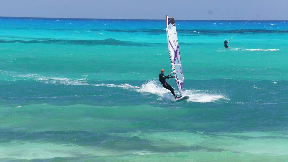 flag_beach_windsurf