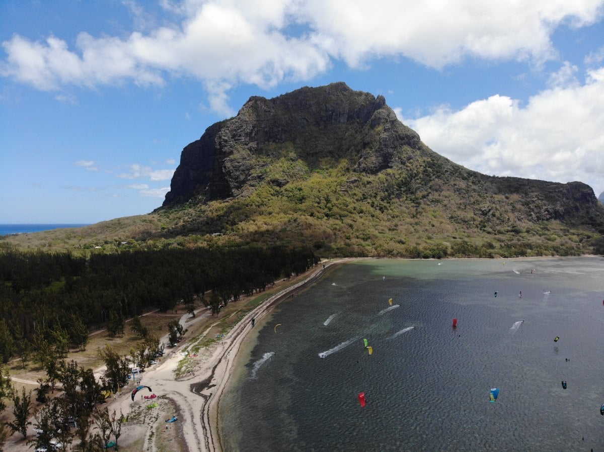 The Le Morne lagoon in Mauritius from the air, with Le Morne Brabant behind the beach